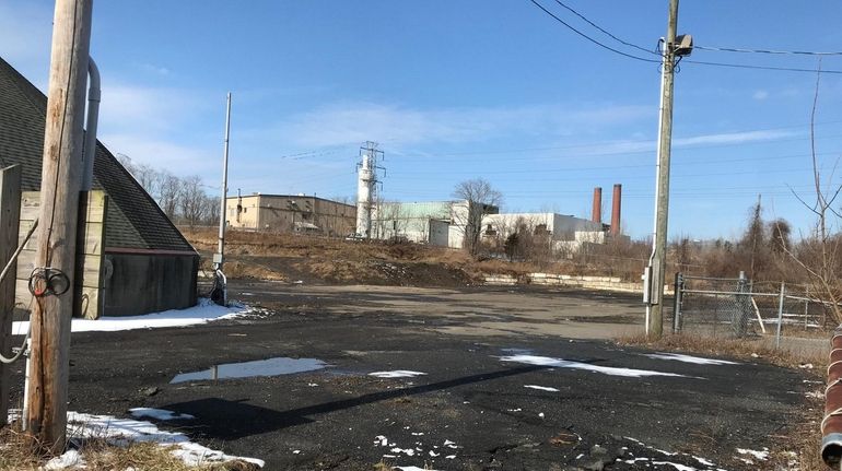 Equipment and debris were removed from property in Old Bethpage...