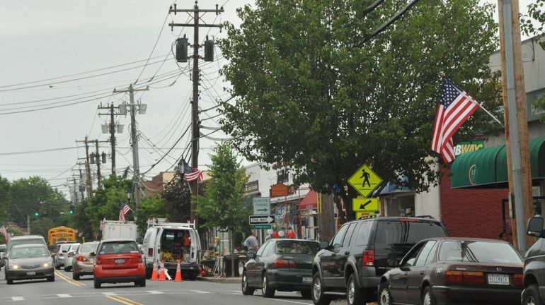 Farmingdale Mayor Ralph Ekstrand wants to remove utility poles and...