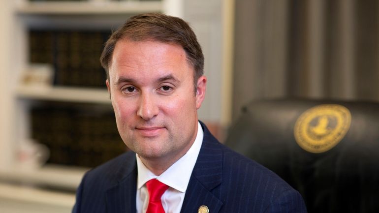 Virginia Attorney General Jason Miyares sits for a portrait in...