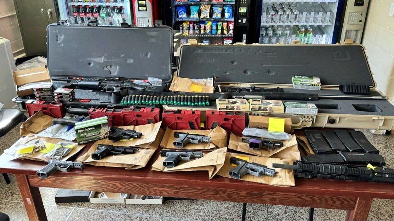 Regional EMS chief, exFBI agent, charged after illegal weapons found