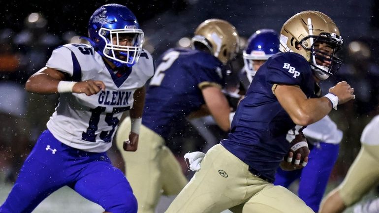 Bayport RB Daniel Aiello takes the handoff through the middle...