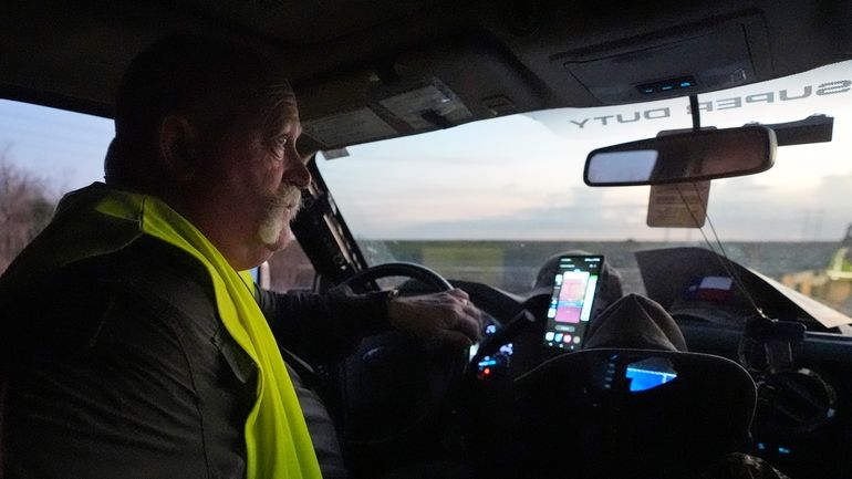 Thomas Aycock, a contractor with the Florida Fish and Wildlife...