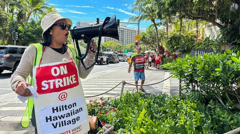 Estella Fontanilla, a housekeeper on strike from the Hilton Hawaiian...