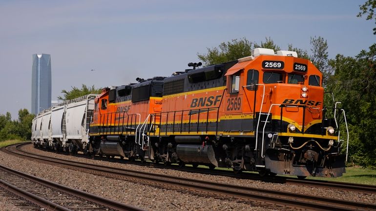 A BNSF locomotive heads south out of Oklahoma City, Sept....