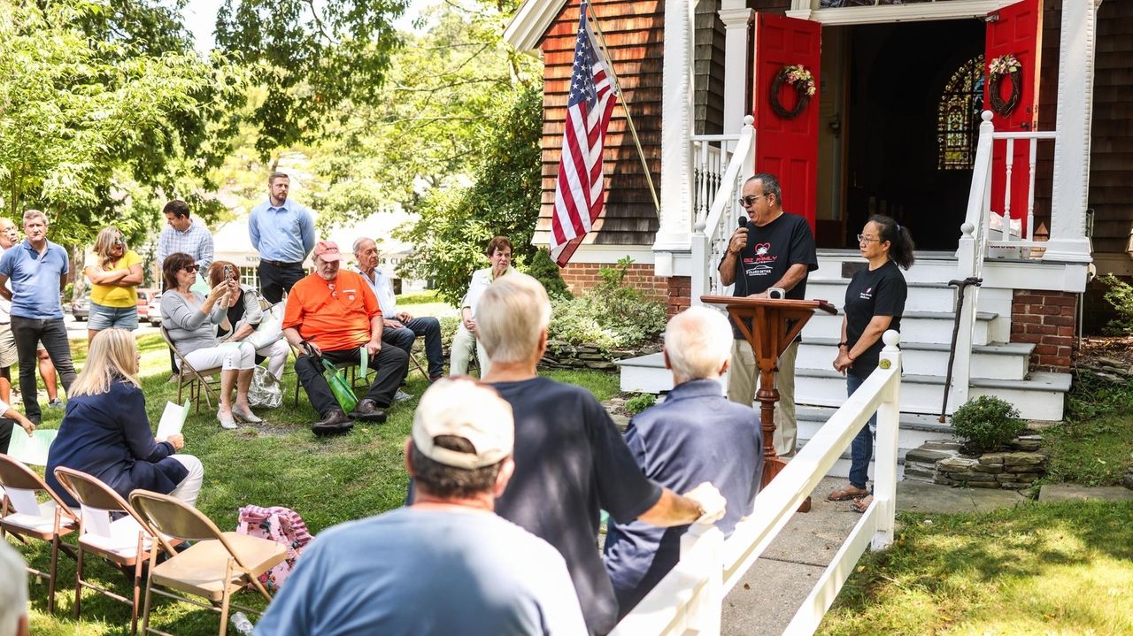 Members of the Stony Brook congregation gather for worship after the flood