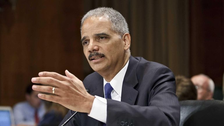 Attorney General Eric Holder testifies on Capitol Hill in Washington....