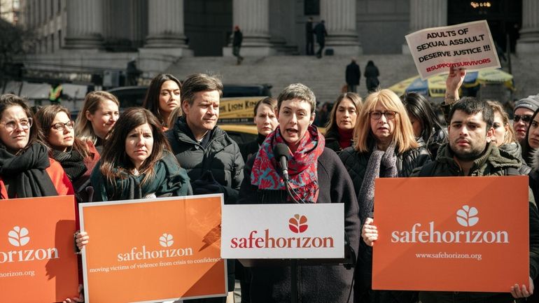 Marissa Hoechstetter, center, speaking at a 2020 rally in Manhattan...