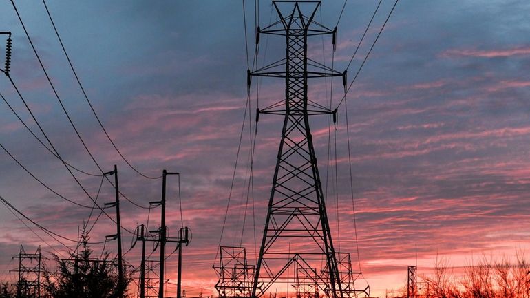 Power lines along Ruland Road in Melville on Feb. 13,...