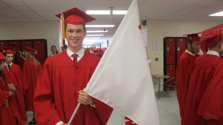 Aaron Schwartz, salutatorian, leads the processional at Half Hollow Hills...