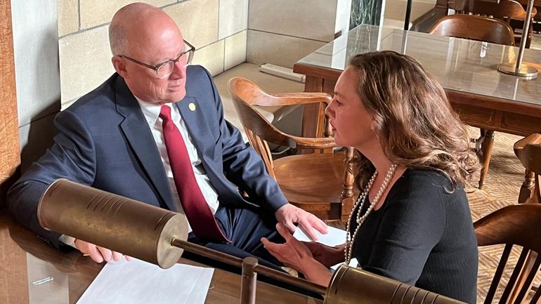 Speaker of the Nebraska Legislature Sen. John Arch, left, discusses...