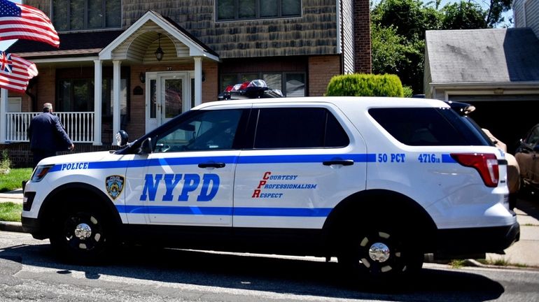 An NYPD patrol car bearing the three-word slogan in use...