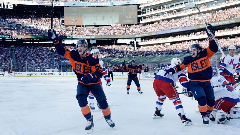 Brock Nelson of the Islanders celebrates his first-period goal against...