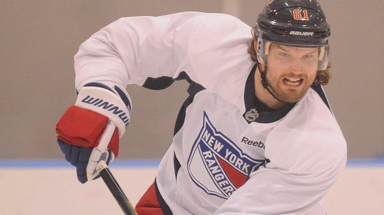 Rick Nash skates during a team practice at Madison Square...