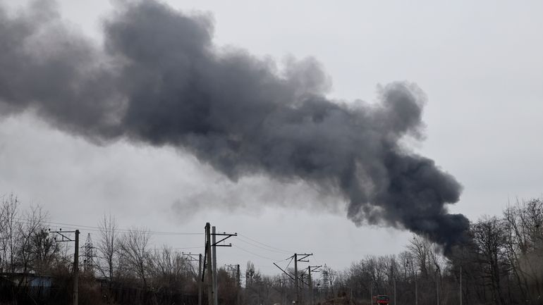 Smoke rises from an energy facility after a Russian attack...