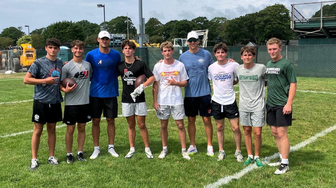 Eli Manning and Daniel Jones help with Girls Flag Football clinic