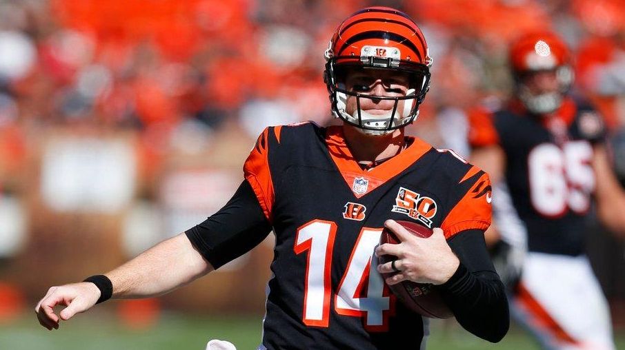 Andy Dalton of the Cincinnati Bengals attempts to break a tackle