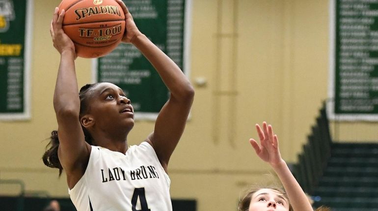 Baldwin's Kaia Harrison drives for a layup during win in...