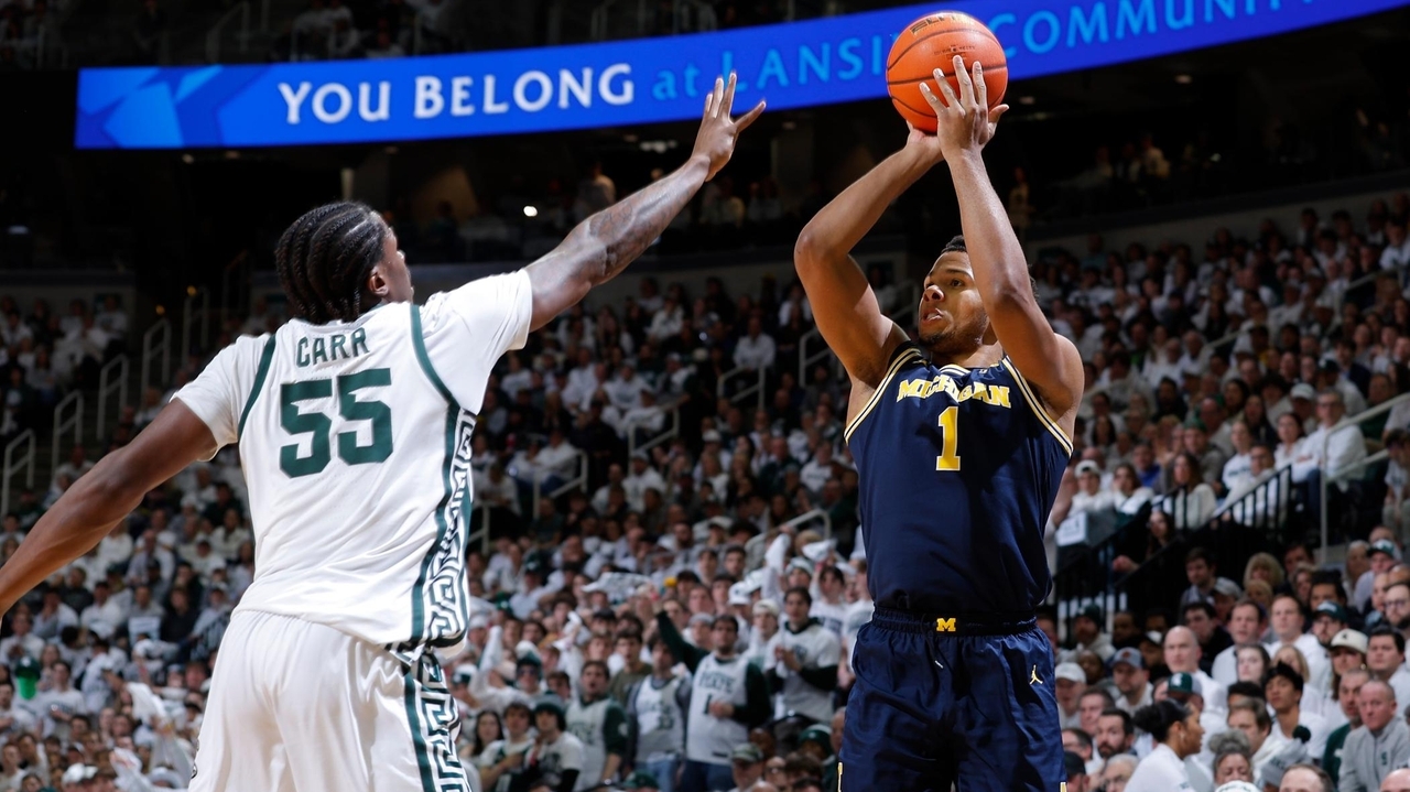 No. 3 Michigan beats No. 7 Michigan State 83-71, takes sole possession ...