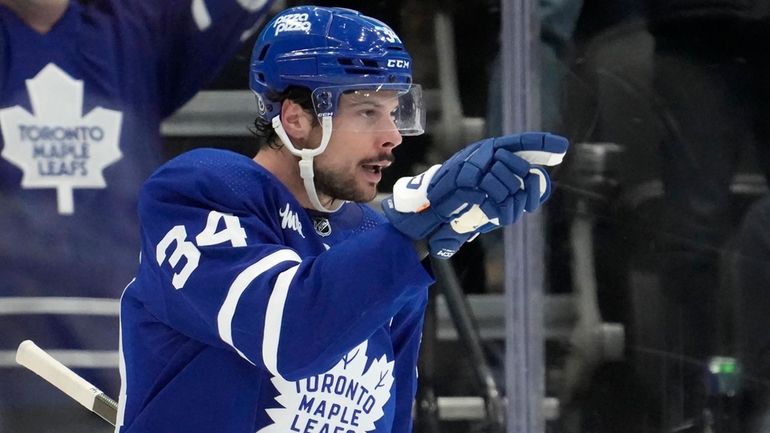 Toronto Maple Leafs center Auston Matthews (34) celebrates his goal...