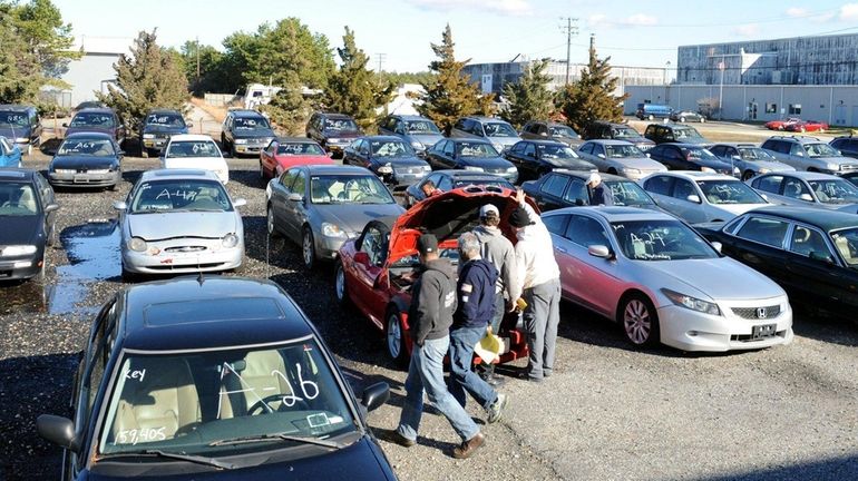 Vehicles at the police impound yard in Westhampton on Thursday,...