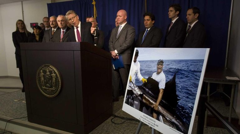 Manhattan District Attorney Cyrus Vance Jr. stands with other federal...