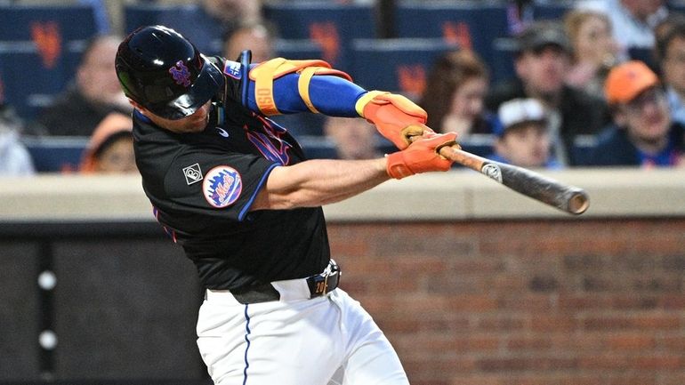 Mets first baseman Pete Alonso singles against the Philadelphia Phillies...