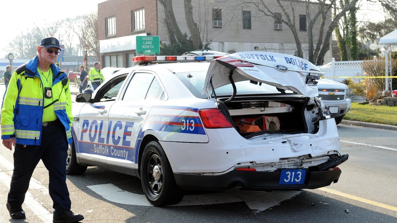 Woman high on drugs, texting, rear-ends patrol car, cops say - Newsday