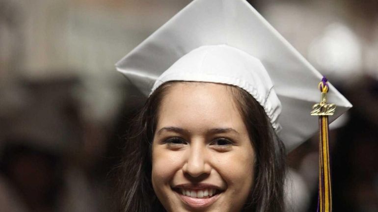 Luisa Gonzalez, 17, poses for a portrait during her graduation...