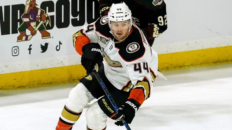 The Ducks' Ross Johnston skates during an NHL game against...