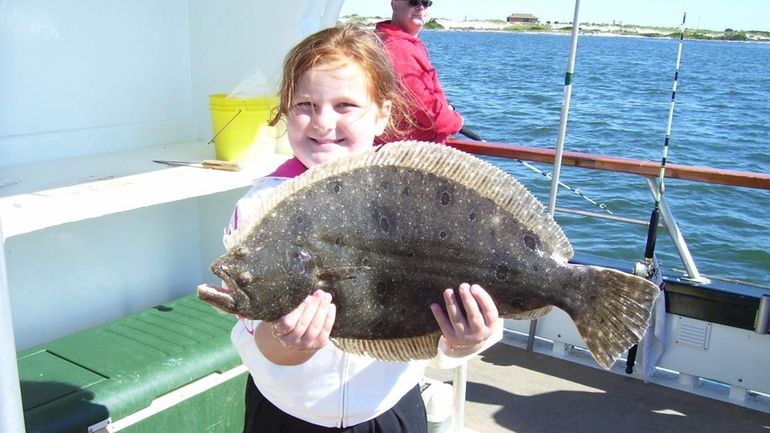 Children enjoy fishing off the Island Princess out of Captree...