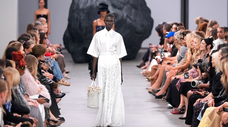 A model walks the runway during the Michael Kors Collection...