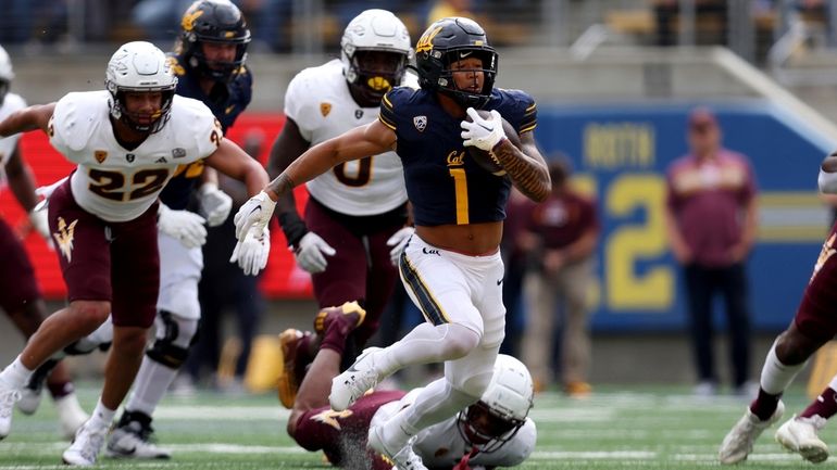 California running back Jaydn Ott (1) runs against Arizona State...