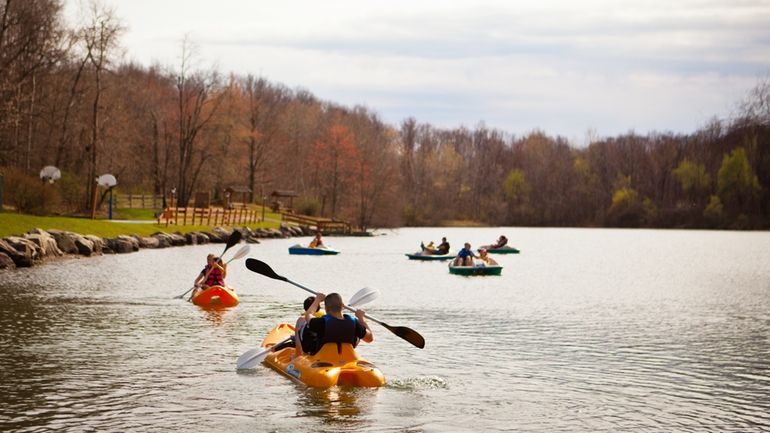 Guests use canoes and paddle boats at the Rocking Horse...