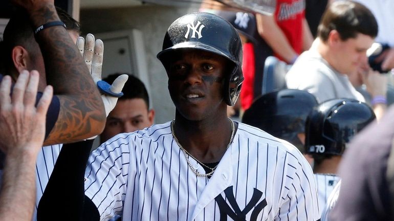 Yankees outfielder Cameron Maybin celebrates his sixth-inning home run against the...