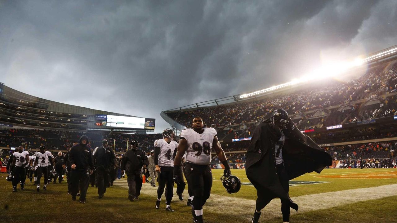 Bears-Ravens game in Chicago resumes after two-hour weather delay