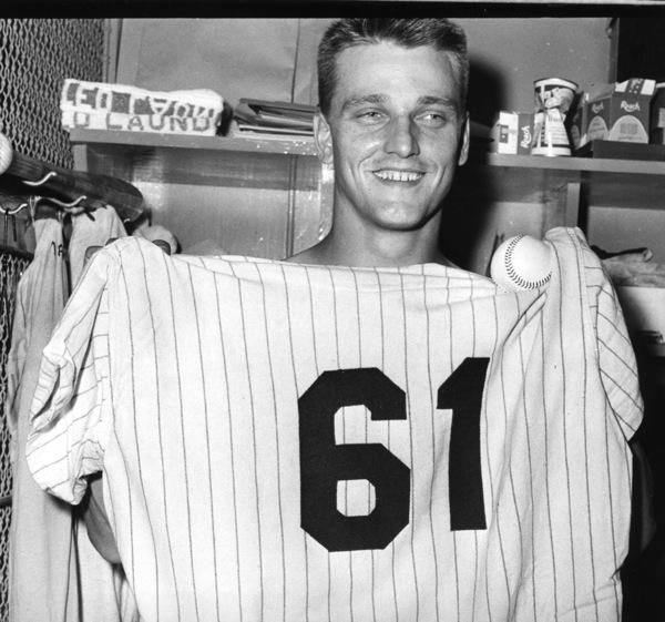 CIRCA 1960's: Outfielder Mickey Mantle,center, Roger Maris, left and