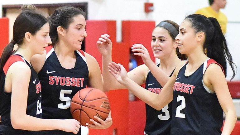 Olivia Mallor #5 of Syosset, second from left, and girls...