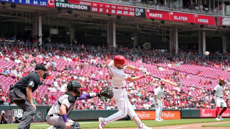 Cincinnati Reds' Tyler Stephenson (37) hits a three-run home run...