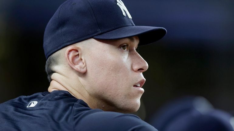 Aaron Judge of the Yankees looks on during the ninth inning...