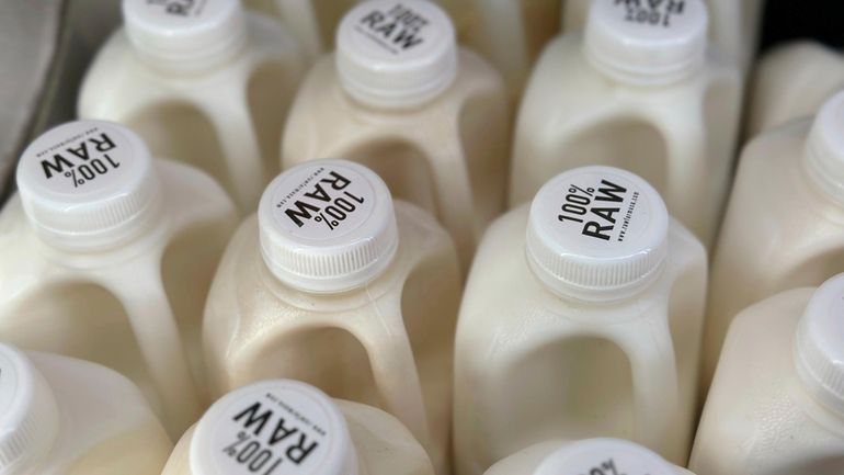 Bottles of raw milk from from Raw Farm of Fresno,...