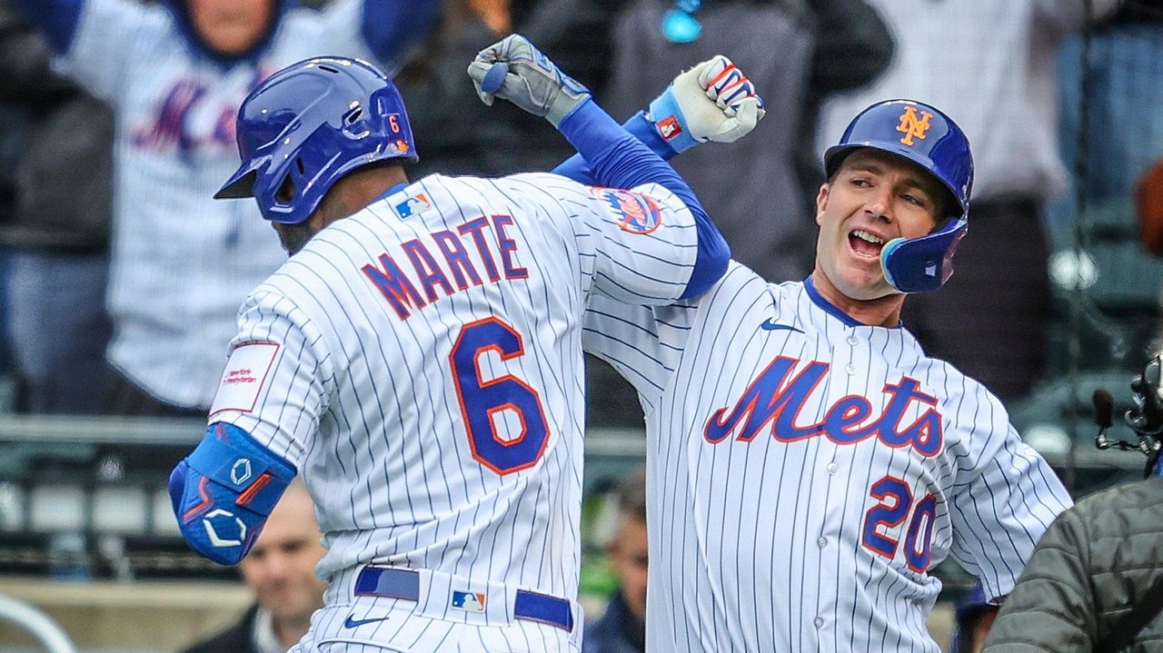 Mets walk to 9-3 win over Marlins in home opener