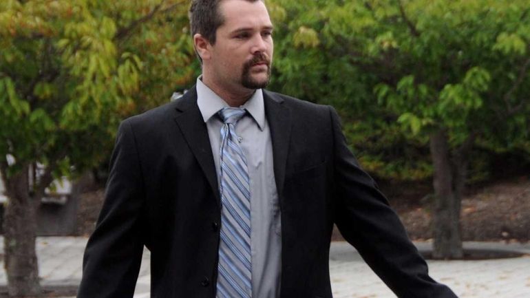 David Heise, of Selden, arrives at Riverhead Criminal Court. (September...