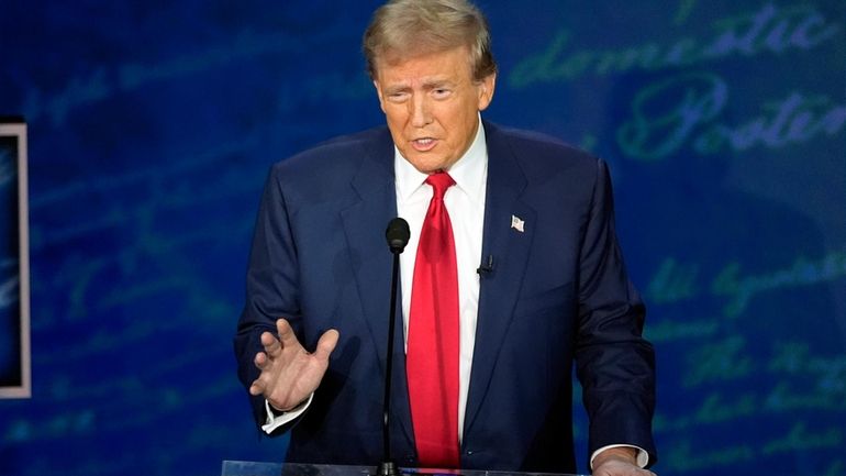 Republican presidential nominee former President Donald Trump speaks during a...