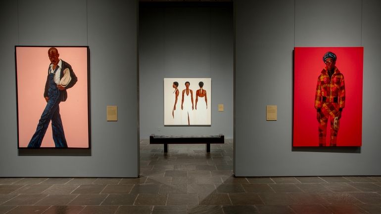 Artworks from the Barkley L. Hendricks exhibition are displayed on...