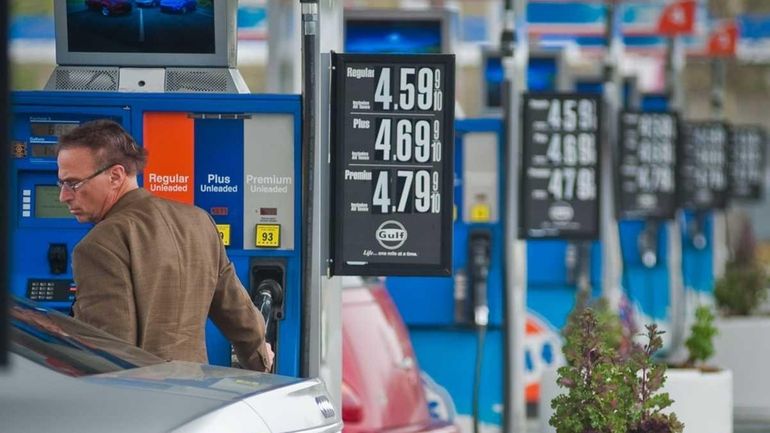 Motorists fuel their vehicles at a Gulf station in Hauppauge....