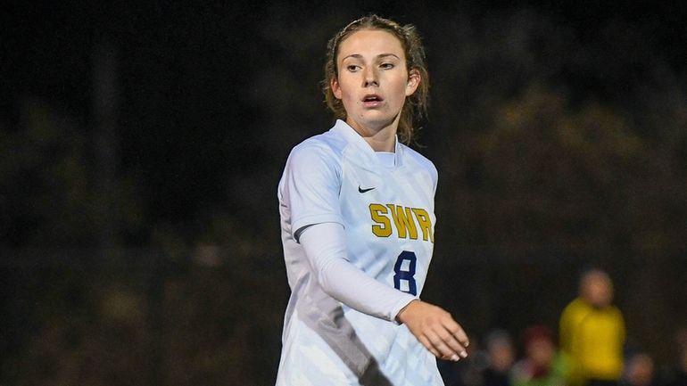 Shoreham-Wading River's Grace Hillis looks on during a NYSPHSAA Class...