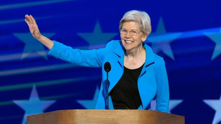 Sen. Elizabeth Warren, D-Mass., reacts to applause during the Democratic...