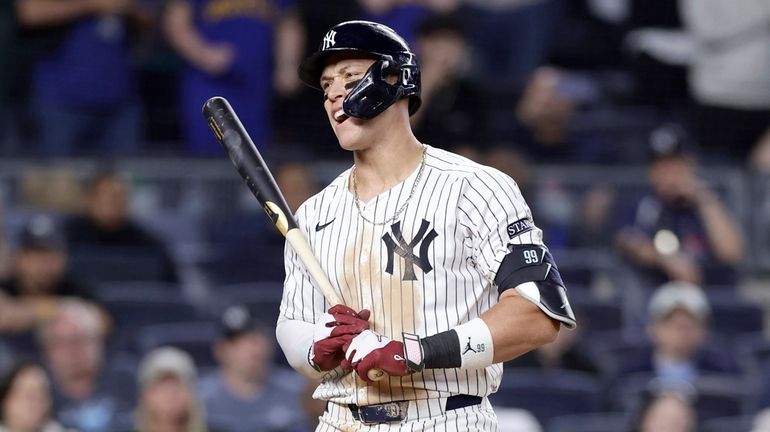 Aaron Judge of the Yankees strikes out during the ninth inning against...