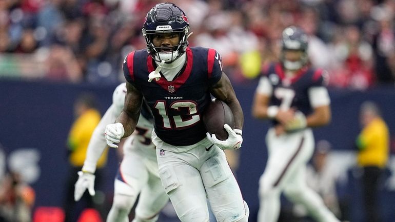 FILE -Houston Texans wide receiver Nico Collins (12) during an...