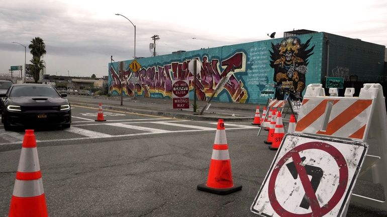 Vehicles exit a ramp to the Interstate 10 in Los...